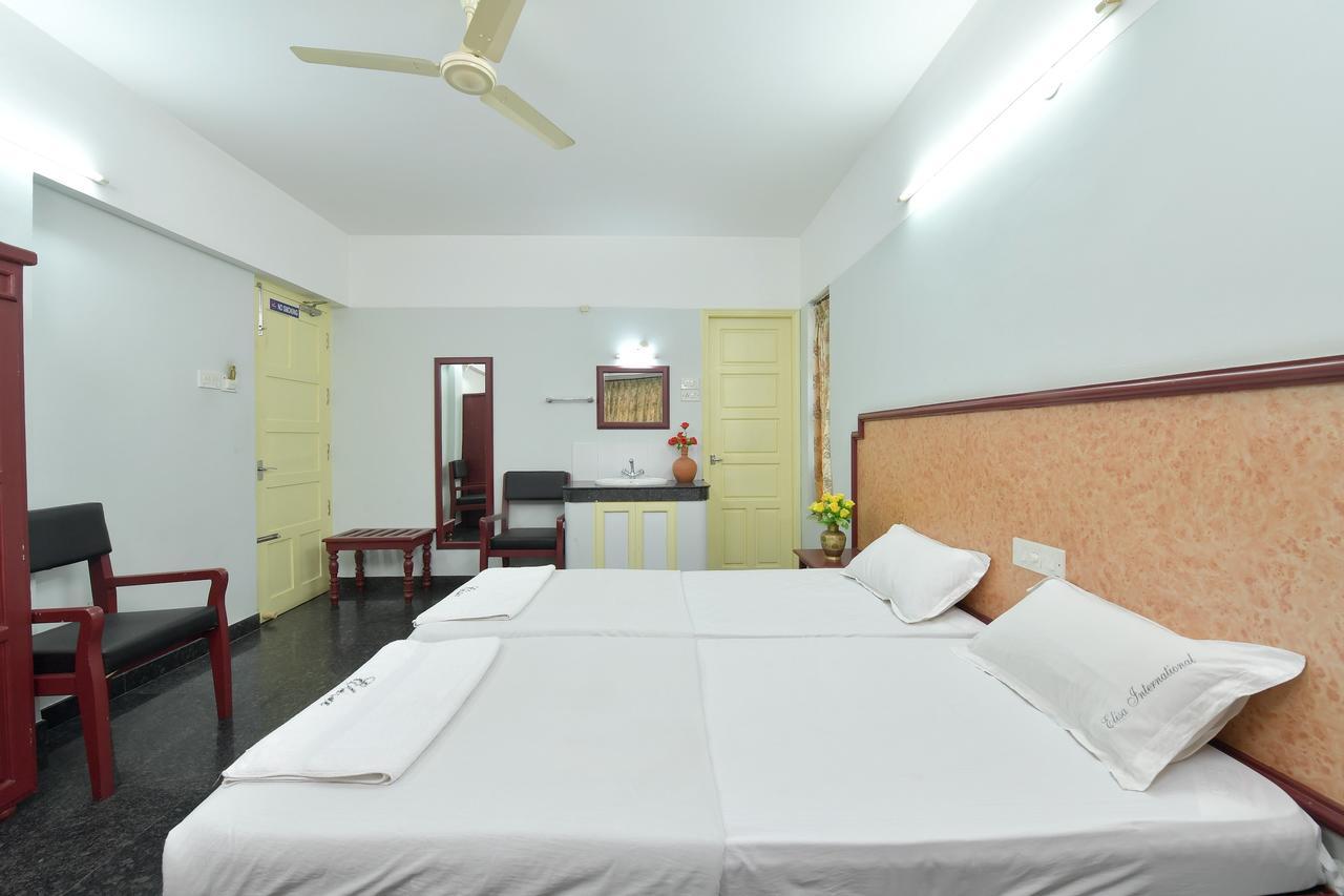 Hotel Elisa International Tourist Home Тривандрум Экстерьер фото
